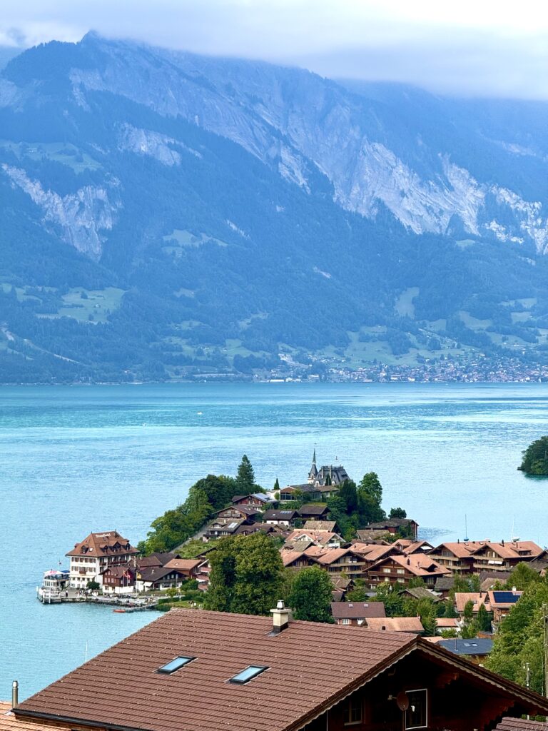 Panoramic view of Iseltwald village and Lake Brienz from the e-bike route near Interlaken