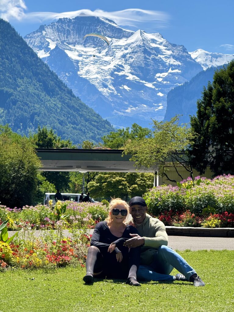 Couple relaxing with Jungfrau views on Interlaken E-bike Tour