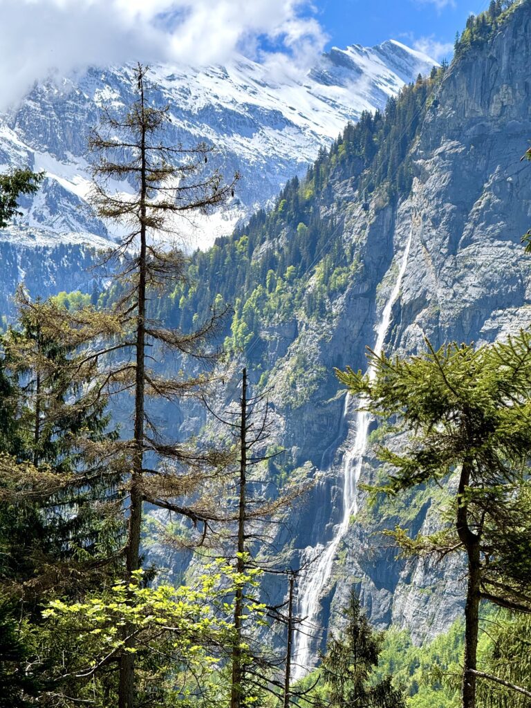 Waterfalls and alpine cliffs in Lauterbrunnen Valley, Switzerland.